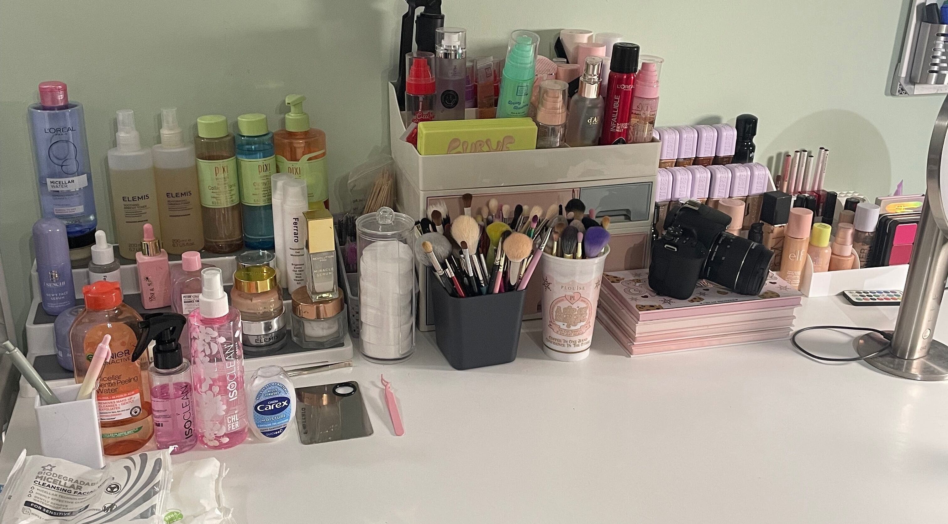 Makeup products and brushes at karlyb.mua.liverpool studio, Liverpool, England, GB, showcasing a professional setup.