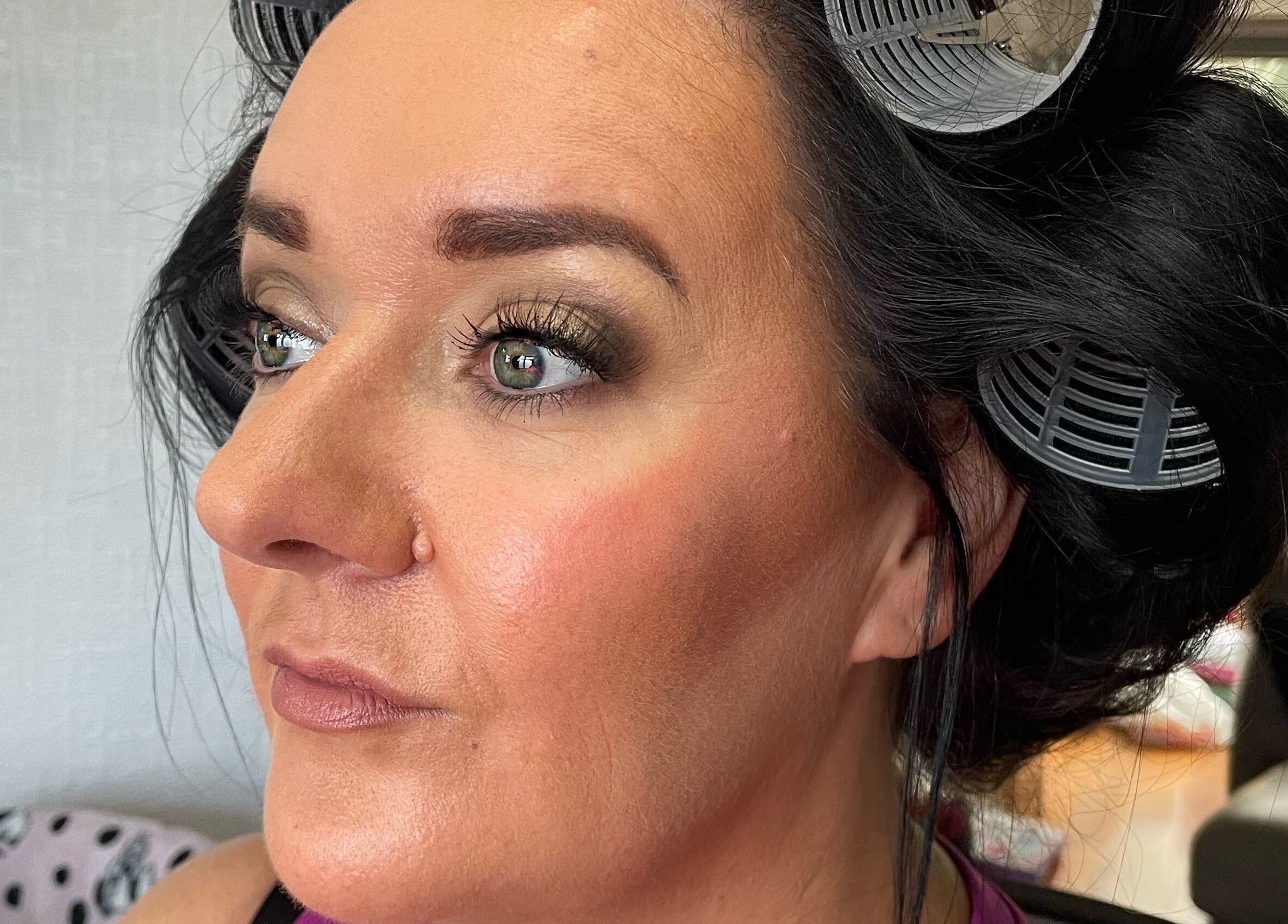 Close-up of a woman with styled hair at karlyb.mua.liverpool in Liverpool, England, GB.