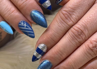 Artistic blue nail designs at Pasea Nail & Spa, Bothell, Washington, US. A blend of creativity and elegance.