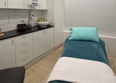 Calm massage room at WA WA Professional Massage Inverell, New South Wales, AU with comfortable table setup.