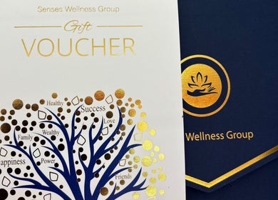 Gift voucher from WA WA Professional Massage Inverell, Inverell, New South Wales, AU with gold details on a blue cover.