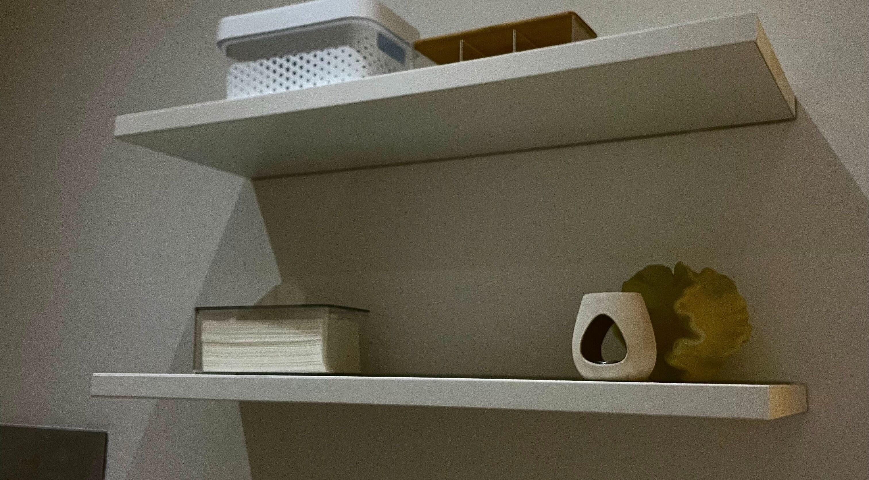 Elegant shelves with decor at Bella Glow Studio, Windhoek, Khomas Region, NA, showcasing modern style.