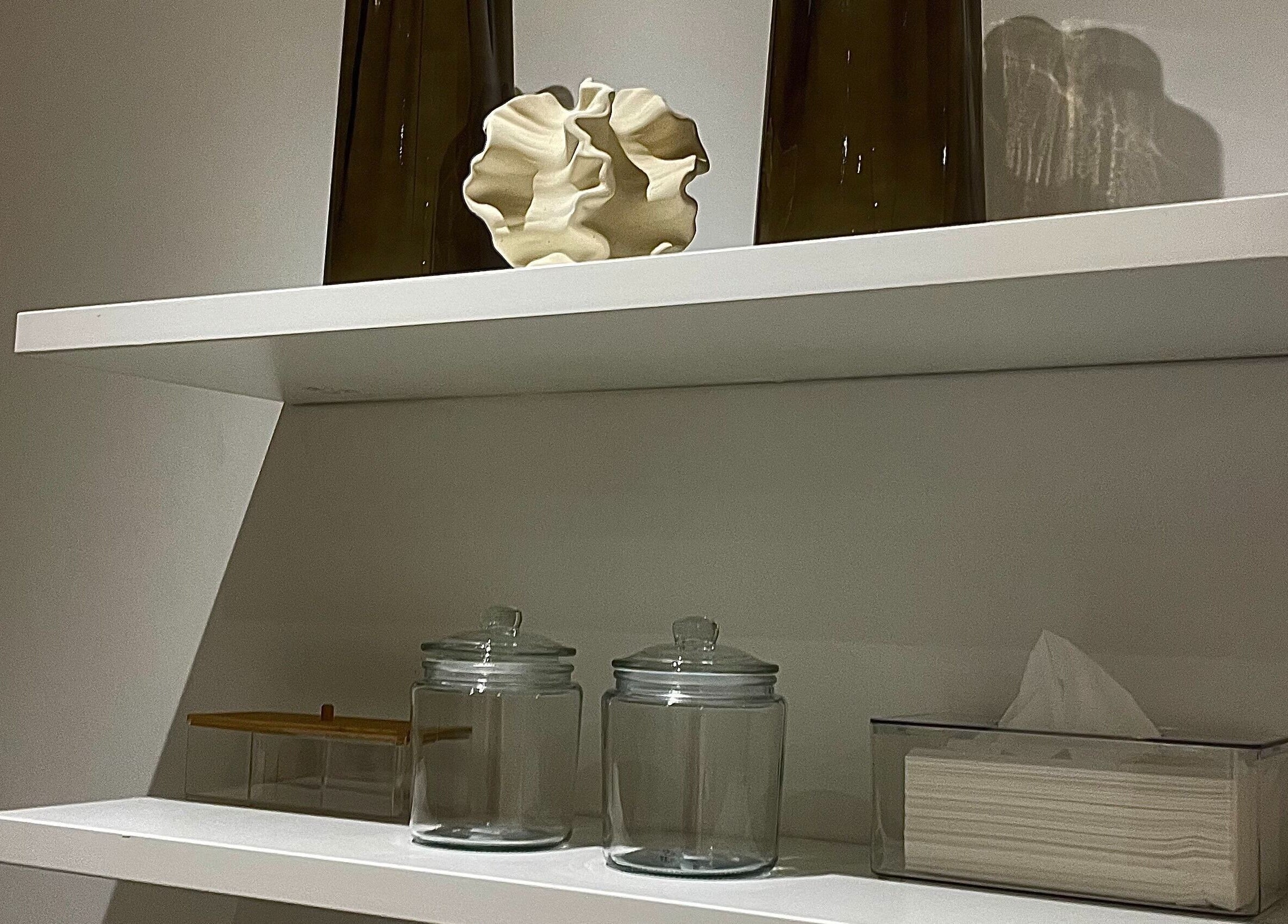 Minimalistic shelf with decor at Bella Glow Studio, Windhoek, Khomas Region, NA.