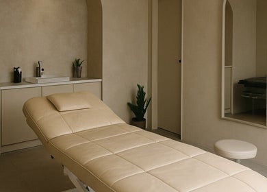 Relaxing treatment room at 23 Aesthetic Studio in Southend-on-Sea, England, GB, with calming neutral tones.