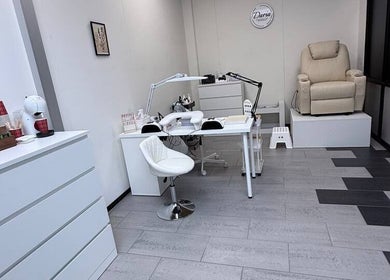 Interior of Daria Art & Grace Nail Studio, Eindhoven, Noord-brabant, NL, featuring modern white decor.