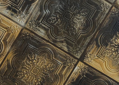 Ornate vintage ceiling design at Snowden Barbers, Scunthorpe, England, GB enhances the classic interior feel.