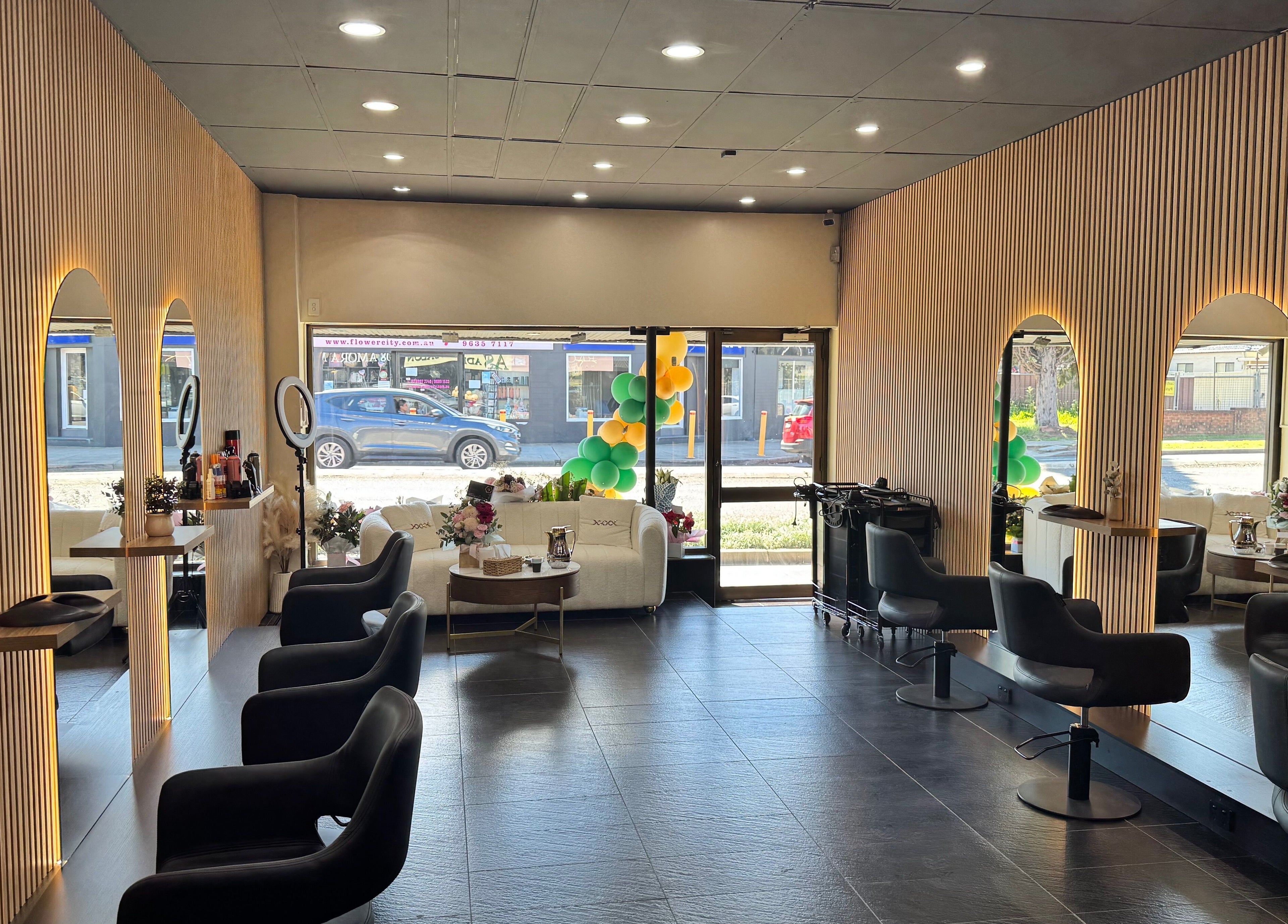 Elegant interior of ADESSA SALON in Merrylands West, New South Wales, AU with stylish seating and modern decor.
