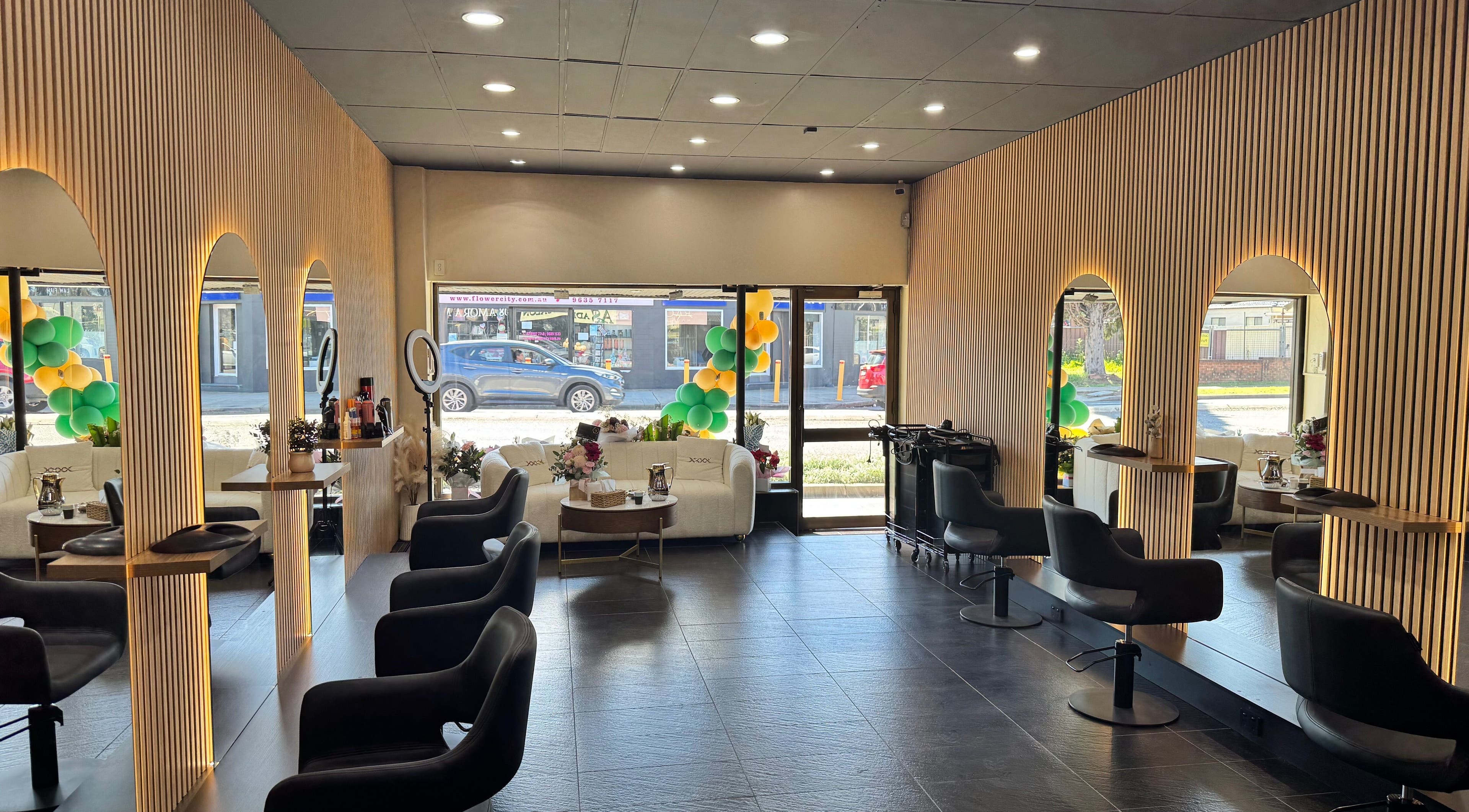 Elegant interior of ADESSA SALON in Merrylands West, New South Wales, AU with stylish seating and modern decor.