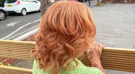 Curly golden hair styled at Hair By Fran Barrett, Ripon, England, GB. Vibrant and elegant look.