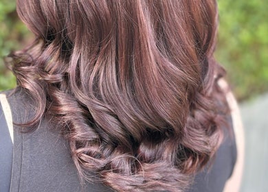 Beautiful curled hairstyle by Hair By Fran Barrett, Ripon, England, GB, showcasing expert hair styling.