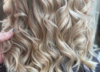 Luxurious blonde curls styled at Hair By Fran Barrett in Ripon, England, GB.