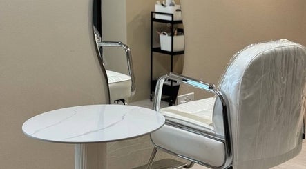 Elegant styling chair and mirror at 888 Studio TBL, Singapore, SG, offering a chic salon experience.