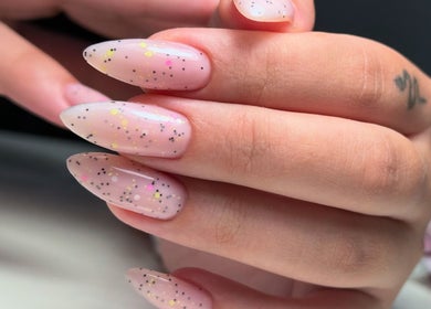 Stylish glitter nail art at UBS Nails – Ukrainian Beauty Studio, Sarasota, US.