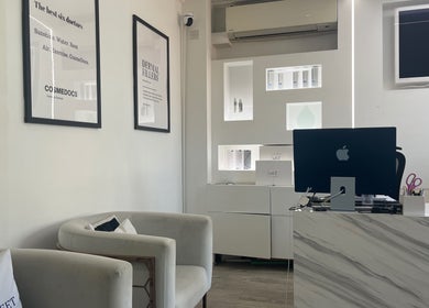 Elegant waiting area at Cosmedocs, London, England, GB, featuring modern decor and serene ambiance.