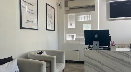 Elegant waiting area at Cosmedocs, London, England, GB, featuring modern decor and serene ambiance.