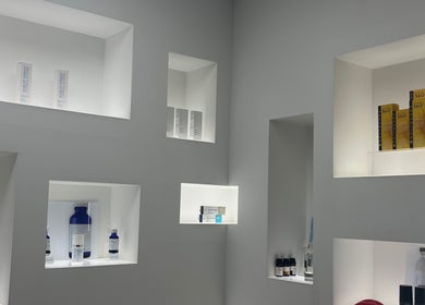 Sleek product display alcoves at Cosmedocs, showcasing skincare items in London, England, GB.