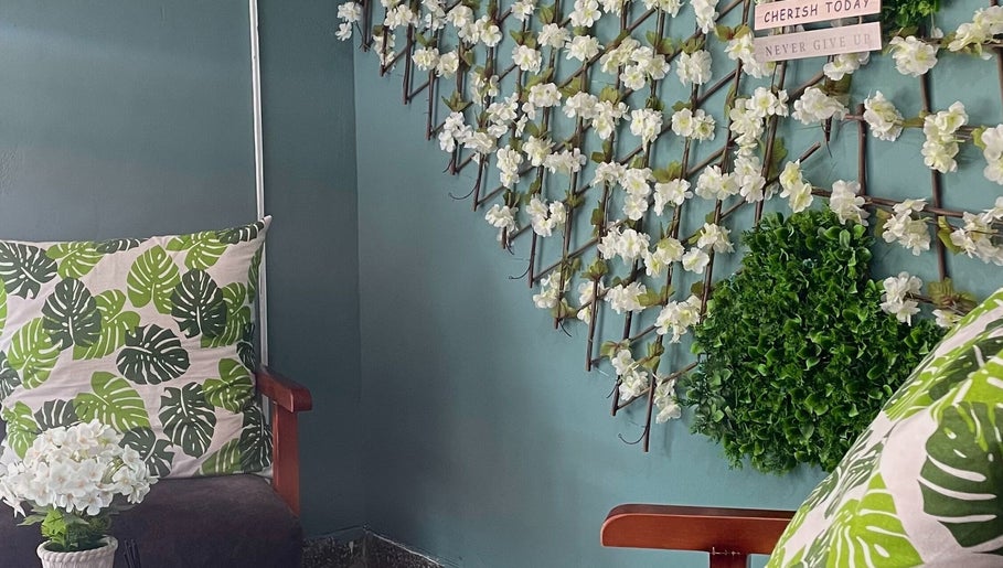 Elegant seating with floral decorations at Oasis of Elegance, Lusaka, Lusaka Province, ZM.