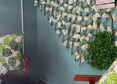 Elegant seating with floral decorations at Oasis of Elegance, Lusaka, Lusaka Province, ZM.