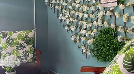 Elegant seating with floral decorations at Oasis of Elegance, Lusaka, Lusaka Province, ZM.