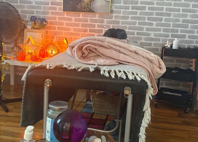 Tays sensory massage in Swansea, Wales, GB, featuring a cozy, tranquil massage room with soft lighting.