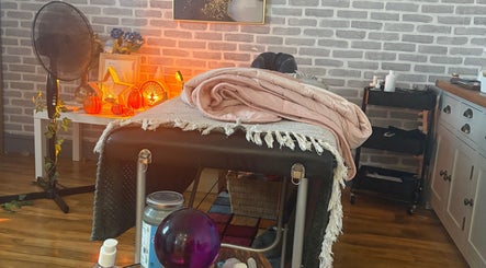 Tays sensory massage in Swansea, Wales, GB, featuring a cozy, tranquil massage room with soft lighting.