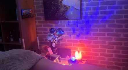Relaxing ambiance at Tays sensory massage, Swansea, Wales, GB with dim lighting and serene decor.