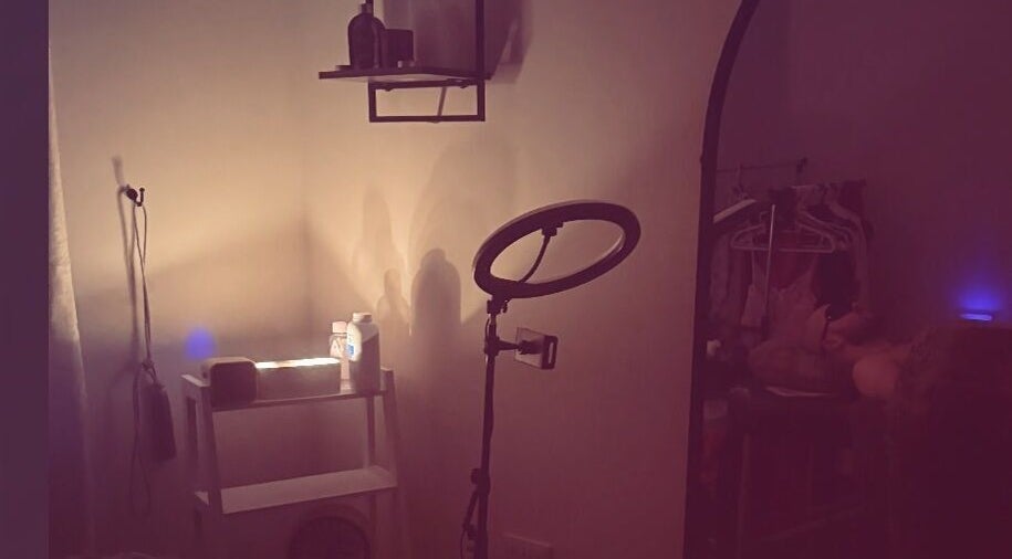 Cozy massage room setup at Tays Sensory Massage in Swansea, Wales, GB with soft lighting and relaxed atmosphere.