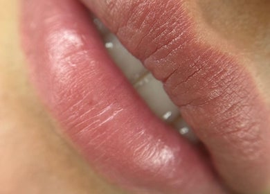 Close-up of perfectly tinted lips at A Class Beauty & Pmu Academy, London, England, GB.