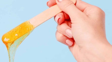Wax stick for hair removal at Tenacity Rose Aesthetics in Hyrum, Utah, US. Perfect for smooth skin.