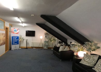 Spacious waiting area at Acupuncture by Mary in Dublin, County Dublin, IE with comfortable seating and soft lighting.