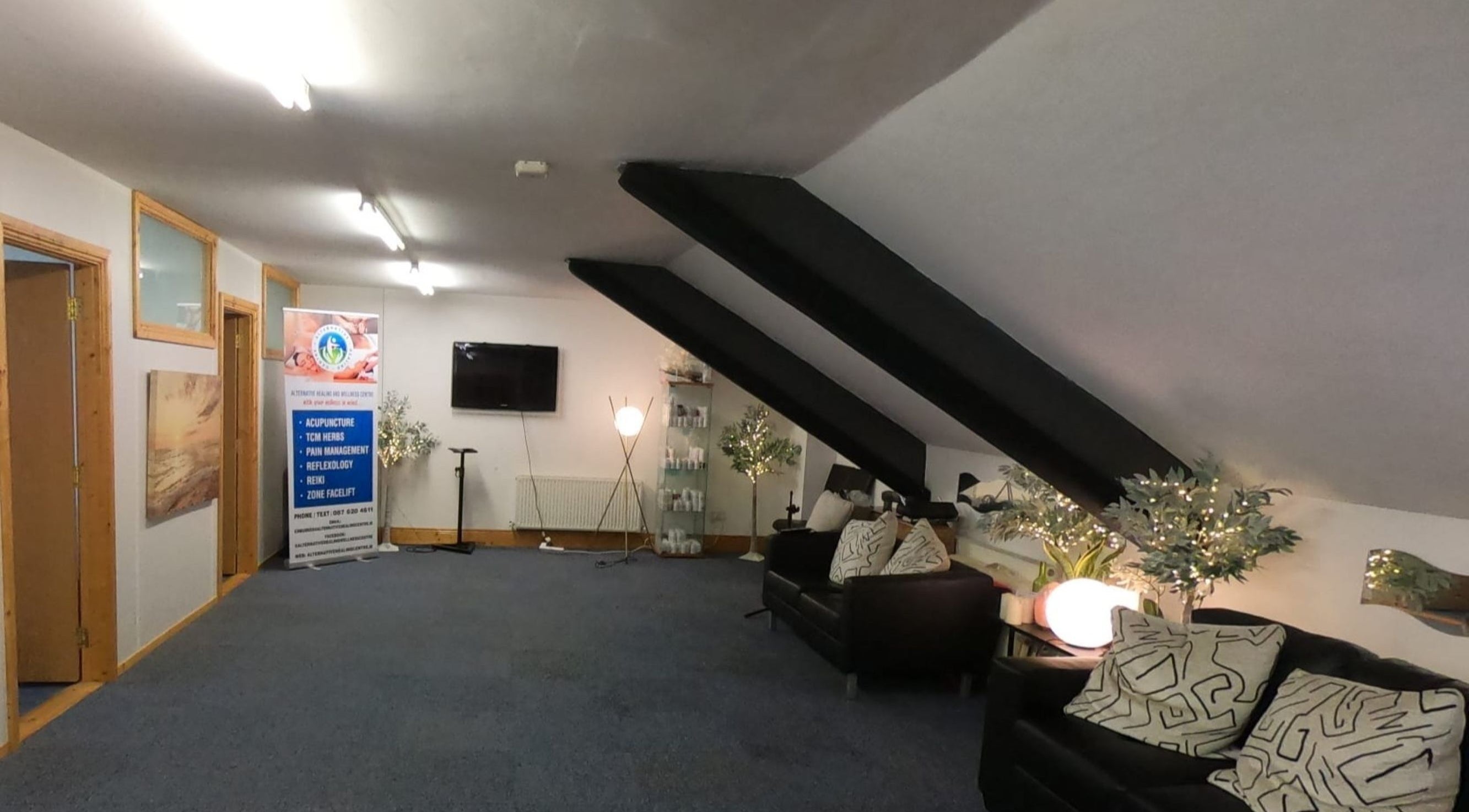 Spacious waiting area at Acupuncture by Mary in Dublin, County Dublin, IE with comfortable seating and soft lighting.