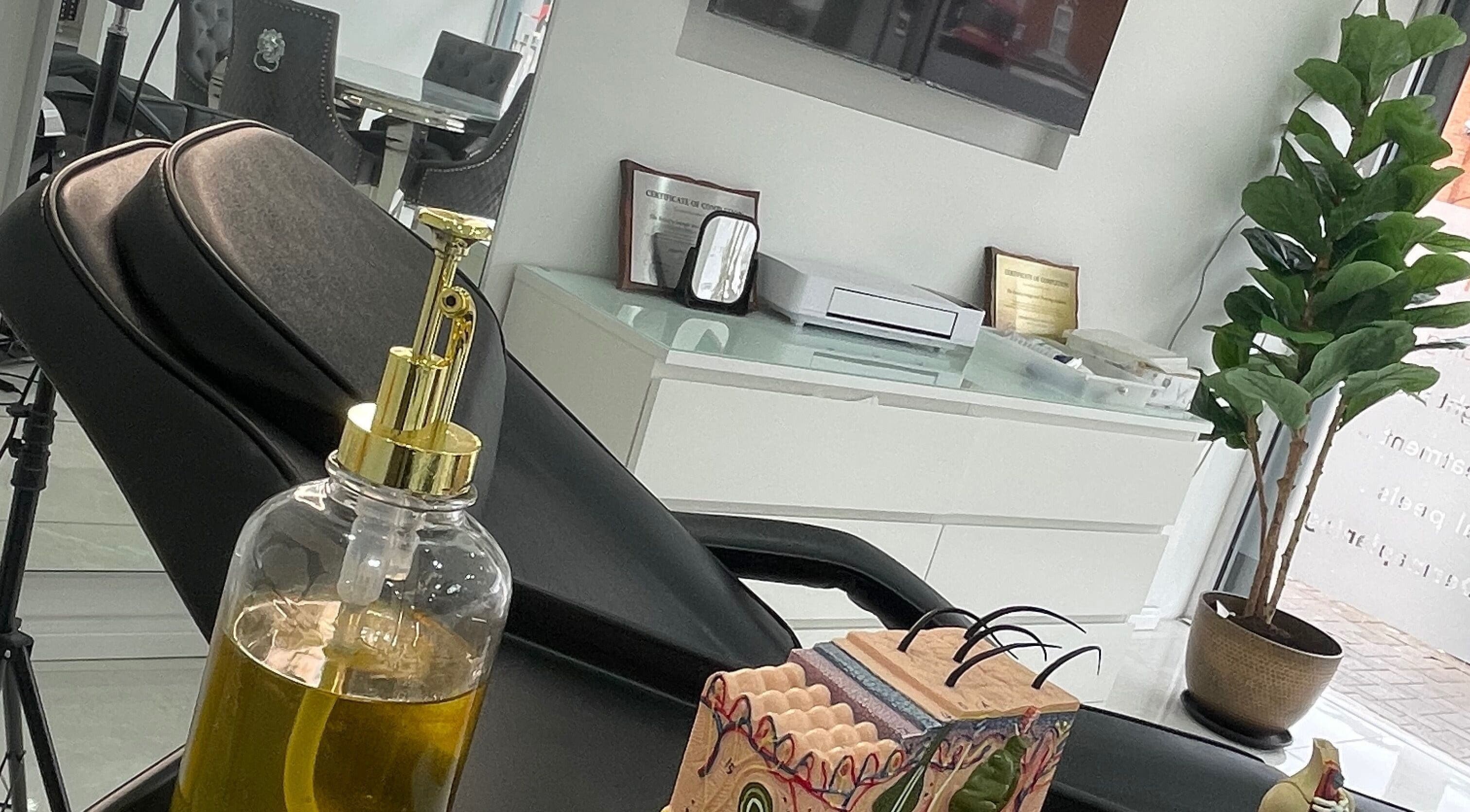 A tranquil treatment room at Rearview Body, Birmingham, England, GB, showcasing an elegant setup and decor.