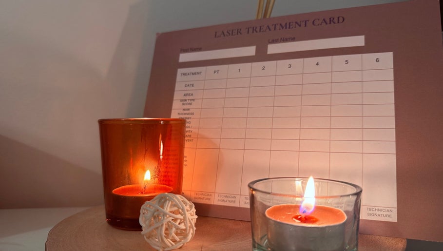 Cozy candles and a treatment card set the serene ambiance at Daisy’s Laser Hair Removal, Par, England, GB.