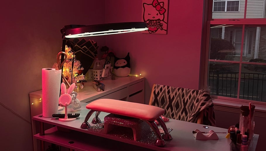 Warm interior of nailsxbrianni in Justice, Illinois, US, showcasing a stylish nail station with unique decor.