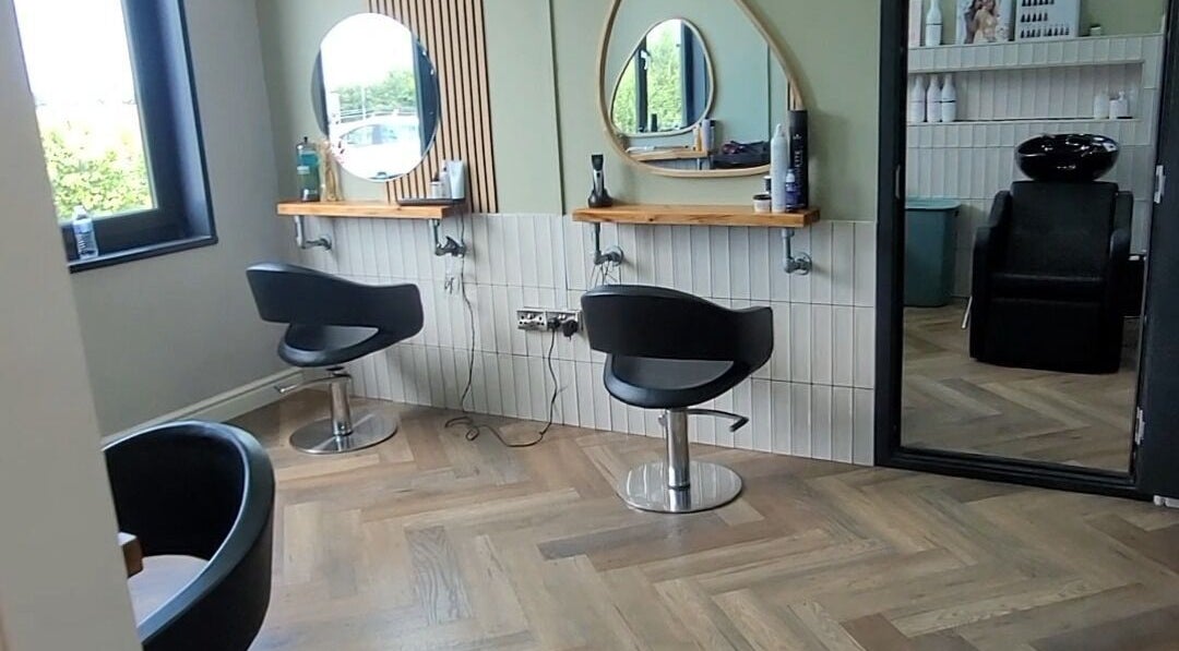 Modern styling chairs and mirrors at Leah Palmer Hair, Milford Haven, Wales, GB.