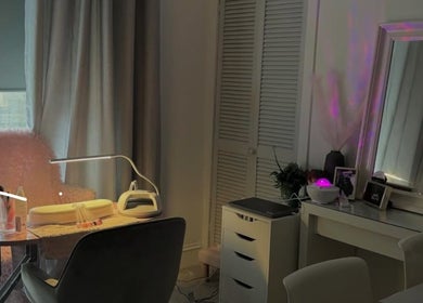 Cozy beauty station at Pink Muse, Aberdeen, Scotland, GB with soft lighting and elegant decor.