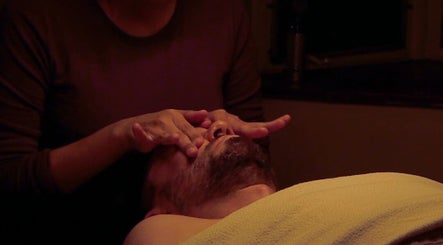 Facial massage at Theresa Irene Esthetics in Long Beach, California, US offers a serene wellness experience.
