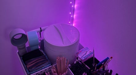Chic Beauty Studio in Landsborough, Queensland, AU features organized beauty tools under soft lighting.