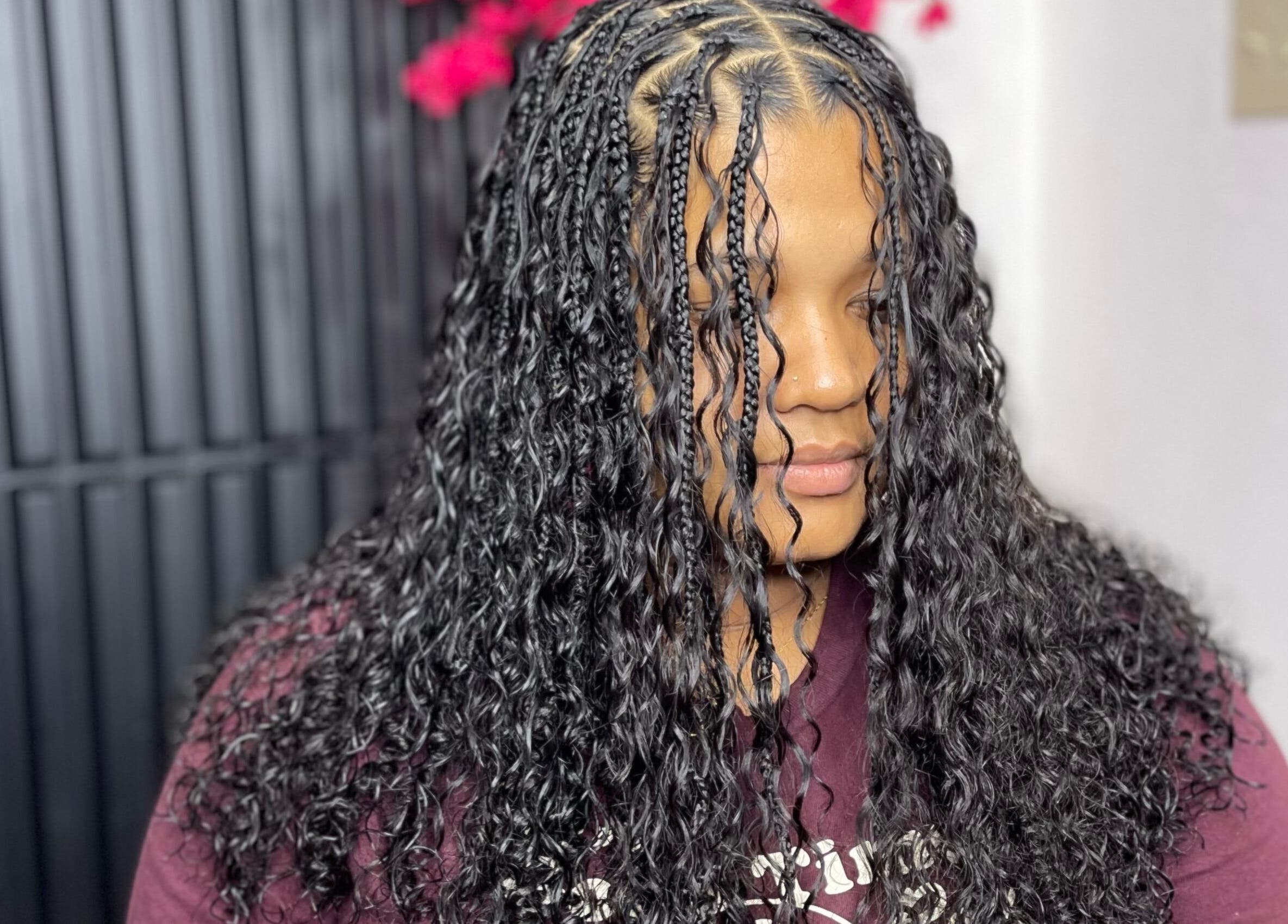 Intricate braided hair style at Jadez Beauty Services in Ocho Rios, JM, showcasing expert hair artistry.