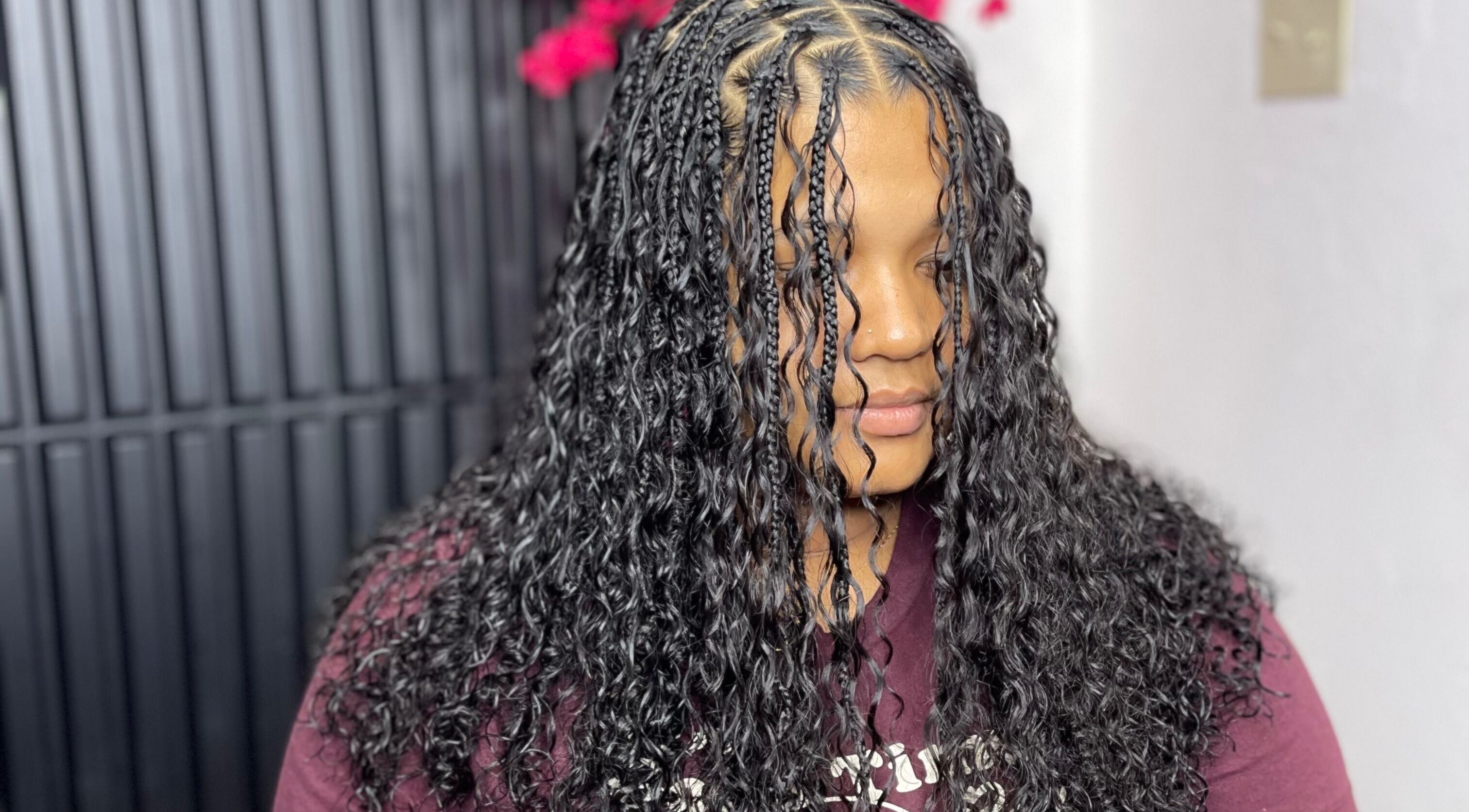 Intricate braided hair style at Jadez Beauty Services in Ocho Rios, JM, showcasing expert hair artistry.