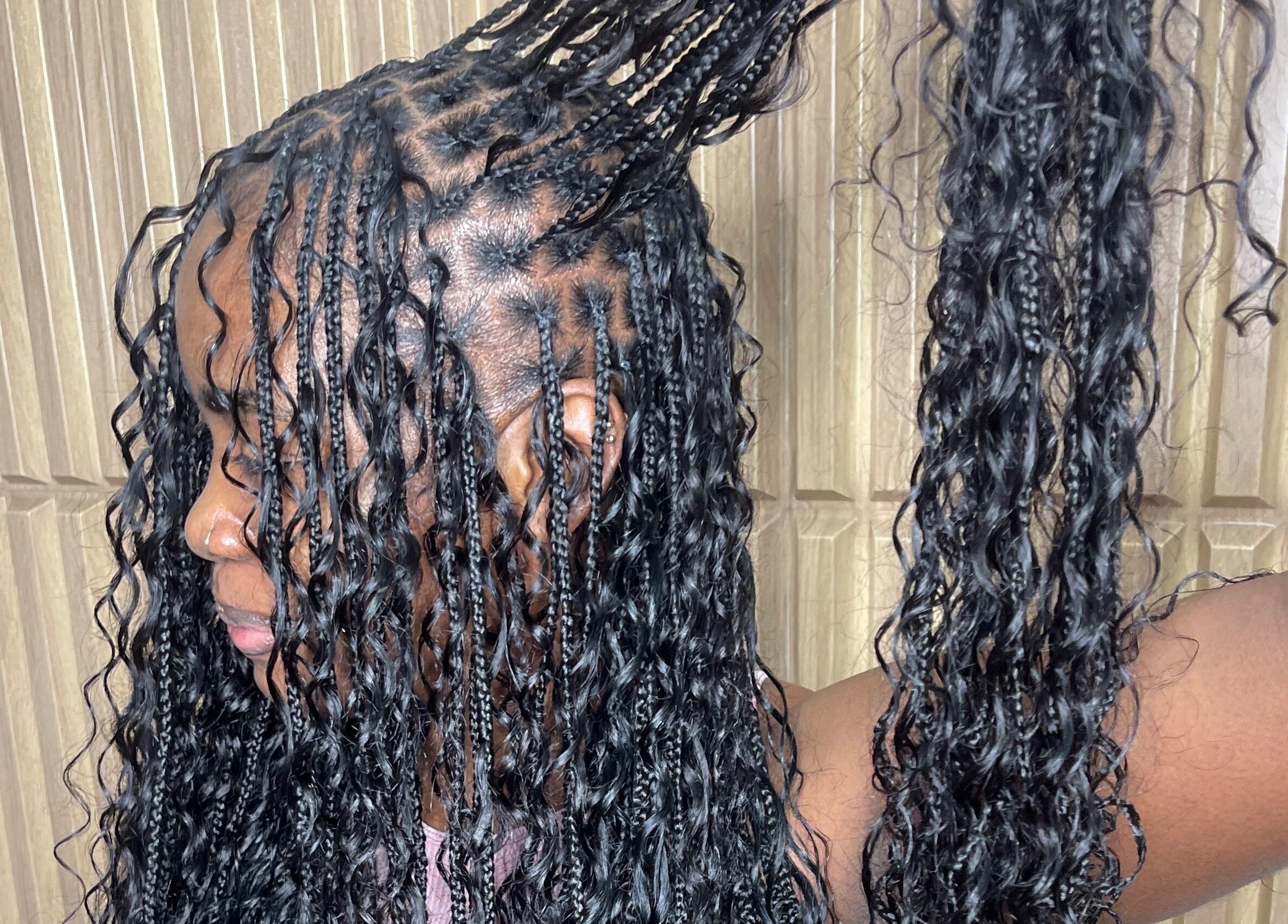 Intricate braiding detail at Jadez Beauty Services, Ocho Rios, JM showcases natural hairstyling skill.