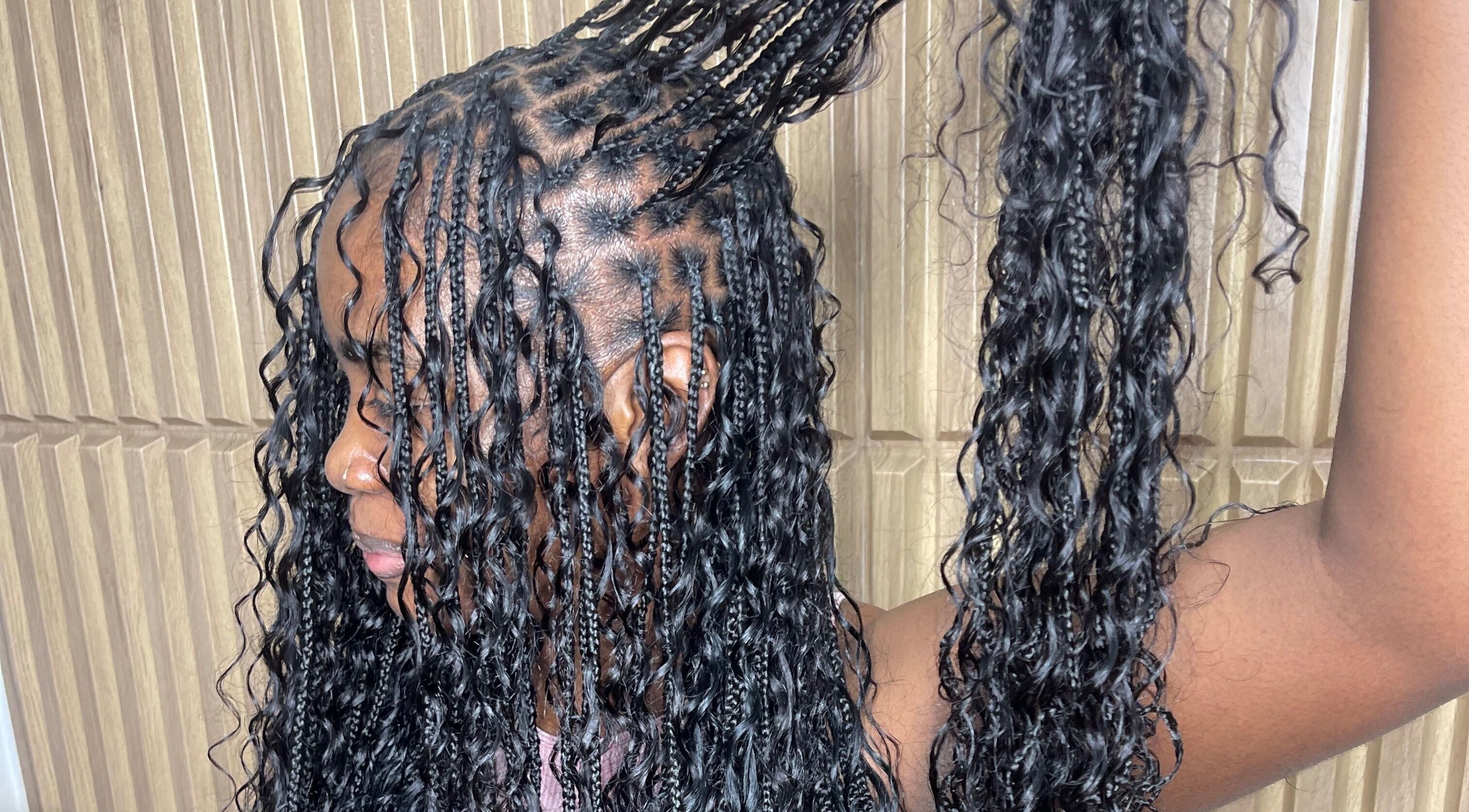 Intricate braiding detail at Jadez Beauty Services, Ocho Rios, JM showcases natural hairstyling skill.