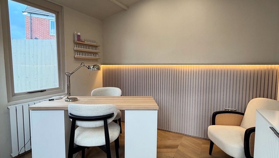 Sleek beauty workstation at Gloss Studio, Peterborough, England, GB with modern decor and ambient lighting.