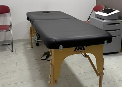 Treatment room with massage table at Totally Men Wellness, Singapore, Singapore, SG.