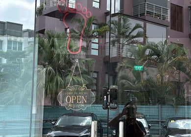 Totally Men Wellness entrance with 'Open' sign in Singapore, Singapore, SG.