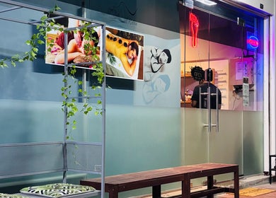 Entrance of No 77 Jalan Malu Malu spa with lush decor, Singapore, Singapore, SG.