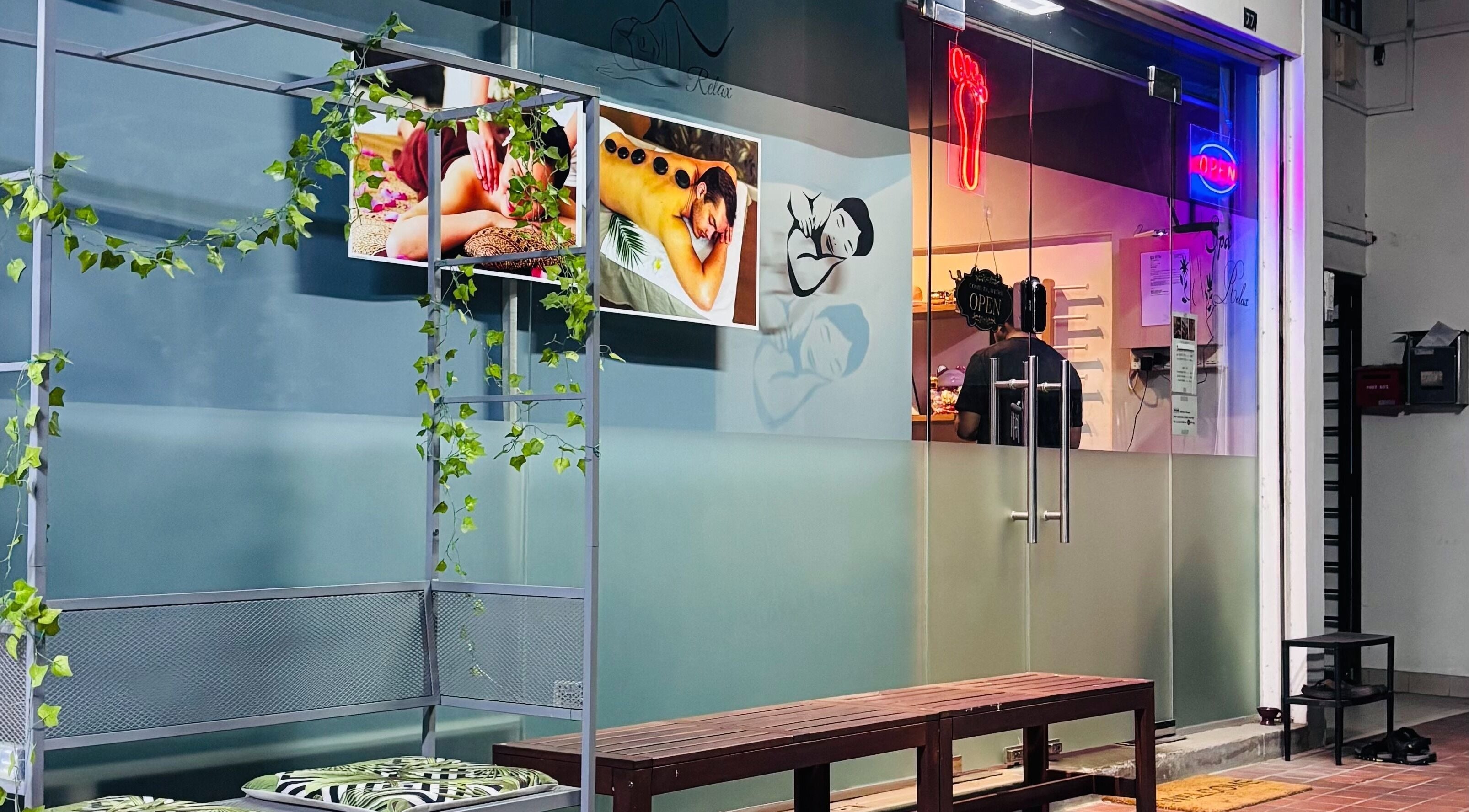 Entrance of No 77 Jalan Malu Malu spa with lush decor, Singapore, Singapore, SG.