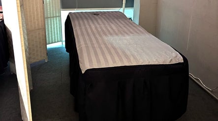 Cozy massage bed at No 77 Jalan Malu Malu, Singapore, Singapore, SG for ultimate relaxation.