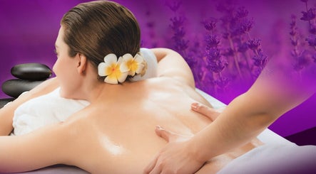 Relaxing massage at LAVENDER Thai Therapy, Bundall, Queensland, AU with flowers and lavender backdrop.
