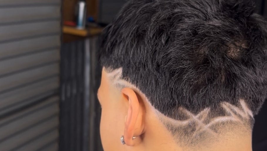 Intricate hair design on a short haircut at k.cutzz1, Springwood, Queensland, AU.